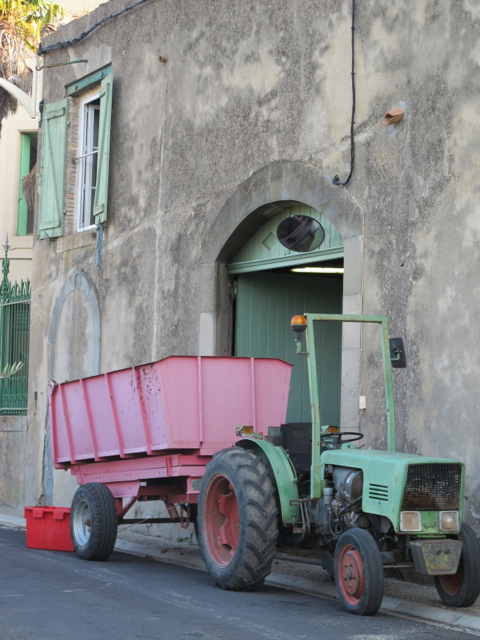 green and red tractor