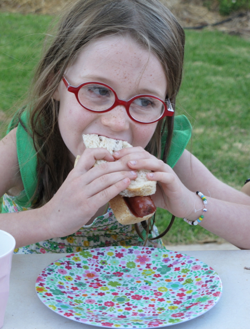 bbq'd sausages and sauce on bread (Lilas consumes a 1000 each Christmas)