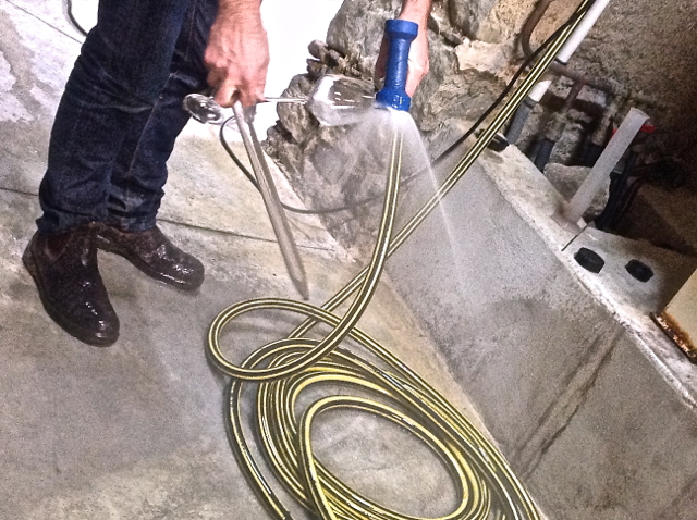 the Vigneron having a spray